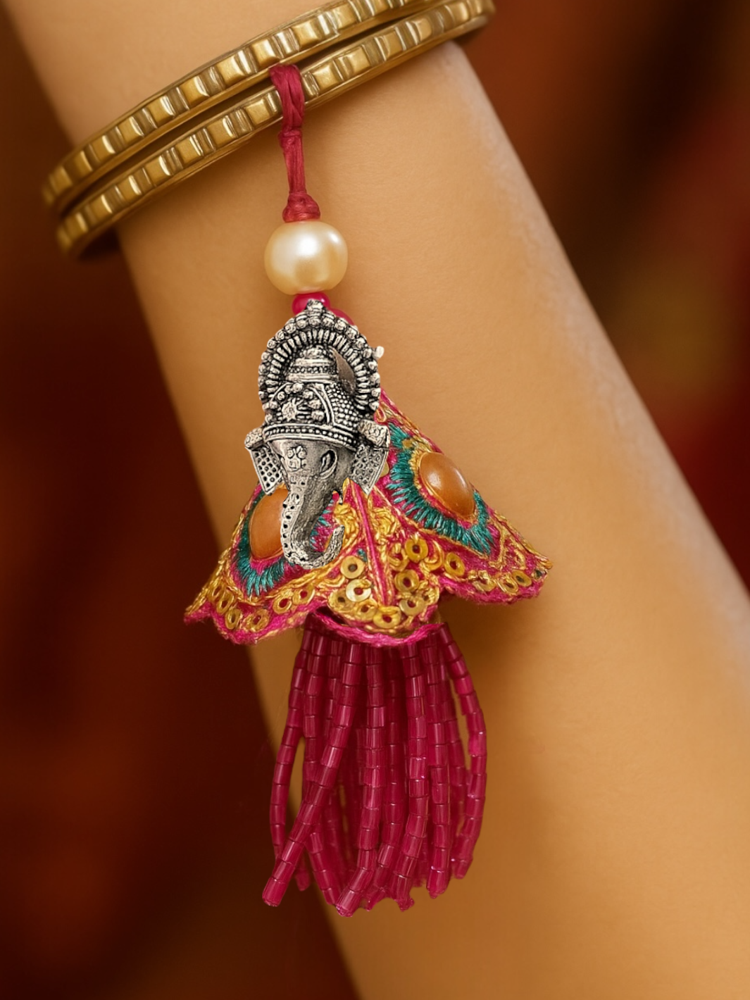 Auspicious Ganesha Pendant Lumba Rakhi for Bhabhi