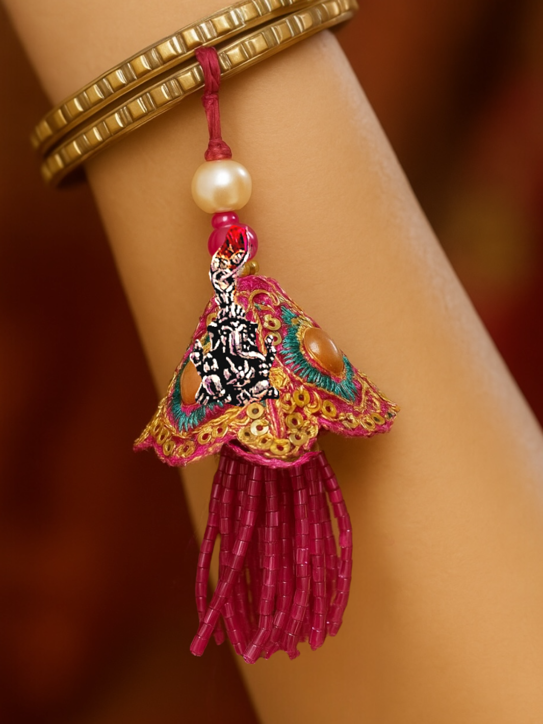 Auspicious Ganpathy Pendant Lumba Rakhi